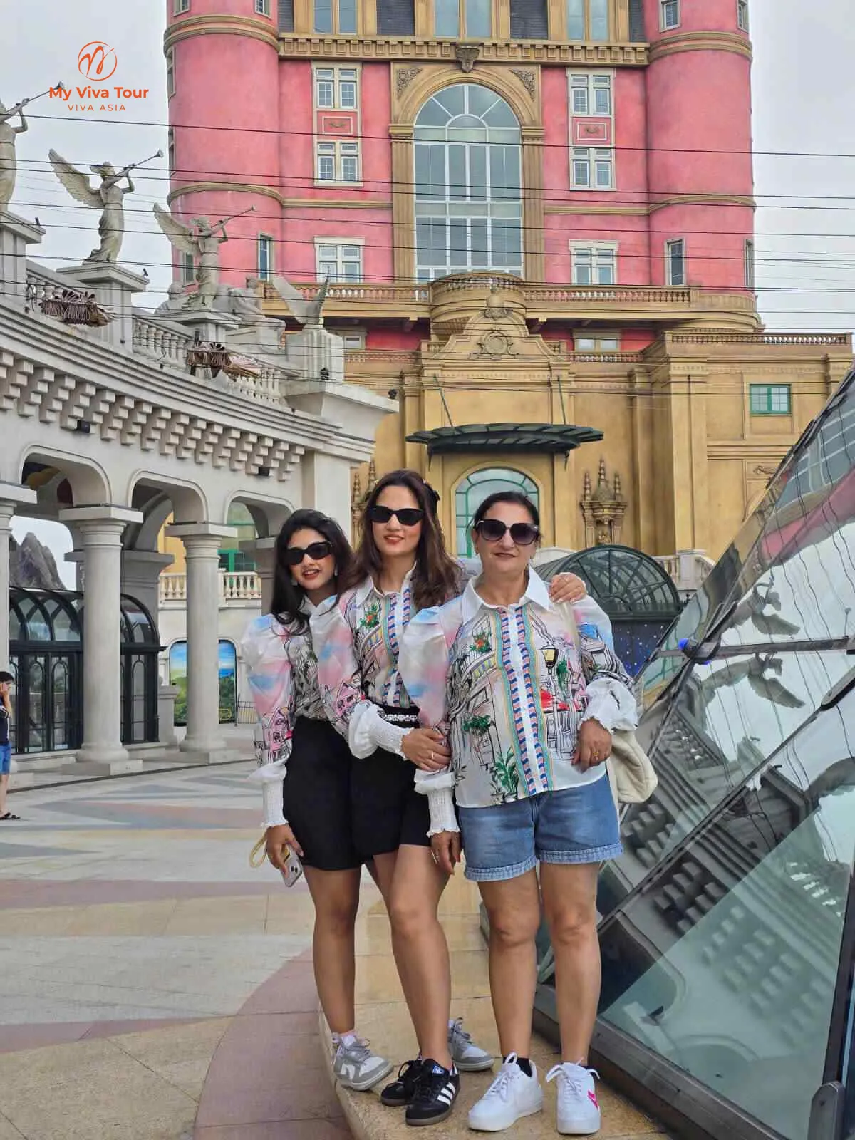Two travellers at the pink French Village in Ba Na Hills, Da Nang