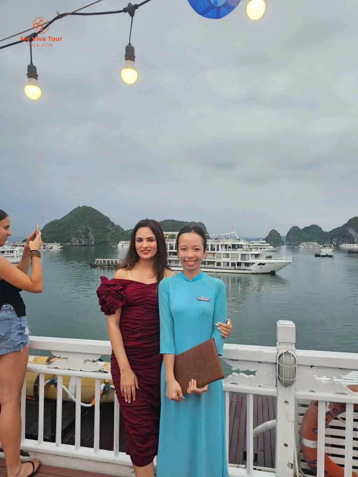 Anniversary dinner on a Ha Long Bay cruise deck at sunset