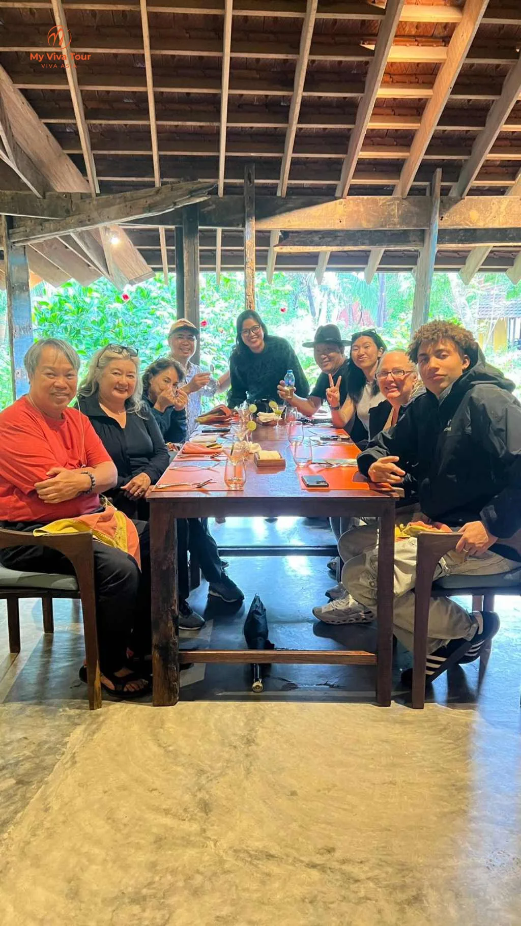 Karen Dieu's group sharing a relaxed garden lunch in central Vietnam, Hoi An