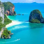 Krabi travel guide — aerial view of Railay's limestone karsts, white-sand beaches and turquoise sea