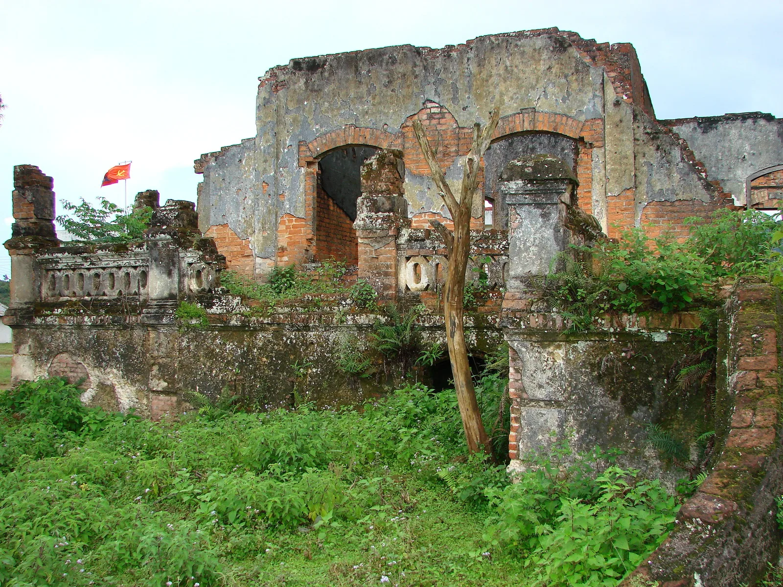 Overgrown brick ruins of the old French-era hospital at Muang Khoun, the former capital of Xieng Khouang near Phonsavan, Laos