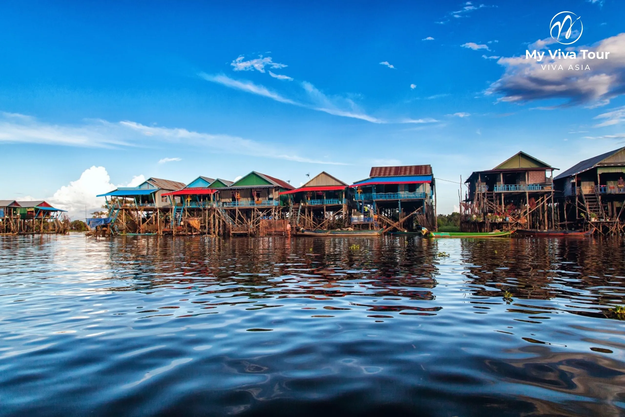 Colourful stilted houses of a floating village on Tonle Sap lake near Siem Reap, Cambodia