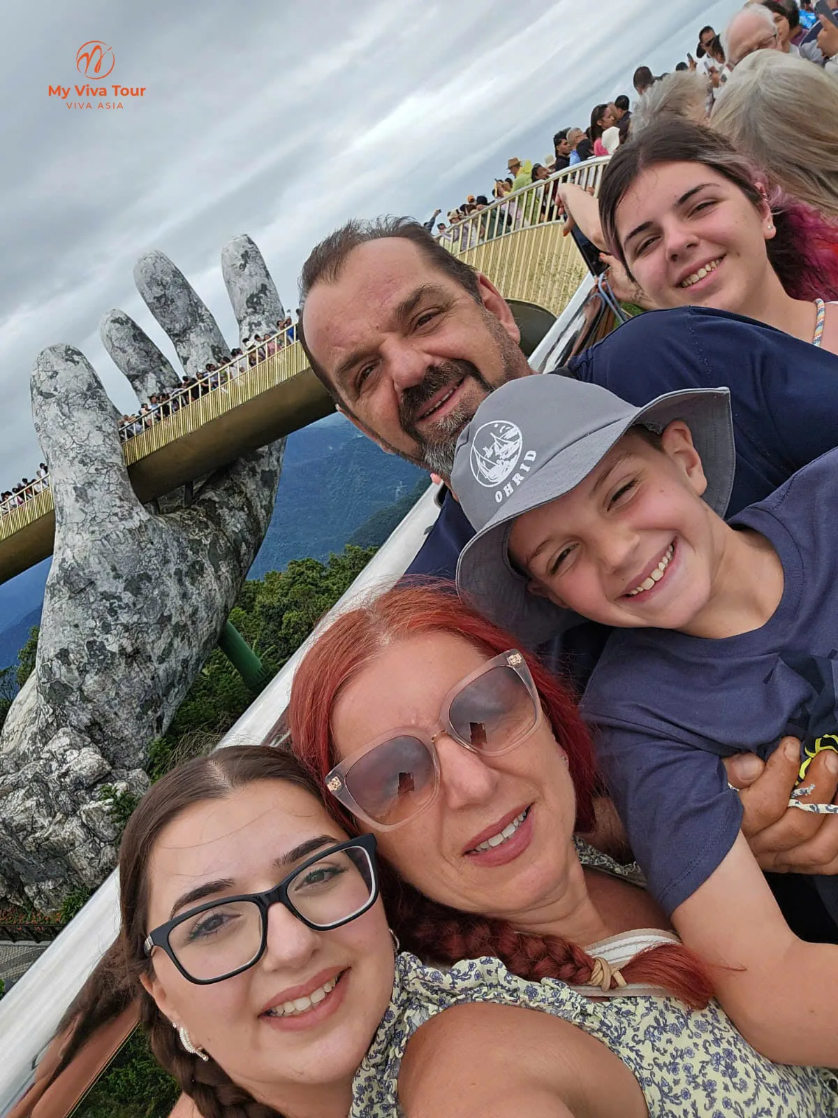 Family selfie on the Golden Bridge at Ba Na Hills, Da Nang