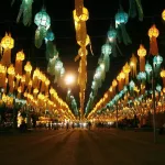 Lanna lanterns glowing over Chiang Mai during the lantern festival, Thailand