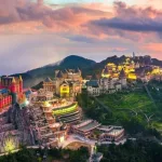 Aerial sunset view of the Sun World Ba Na Hills hilltop resort and its French-style castles near Da Nang, a highlight on any Vietnam itinerary