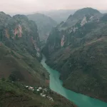 Ha Giang travel guide — the turquoise Nho Que River winding through the Ma Pi Leng gorge