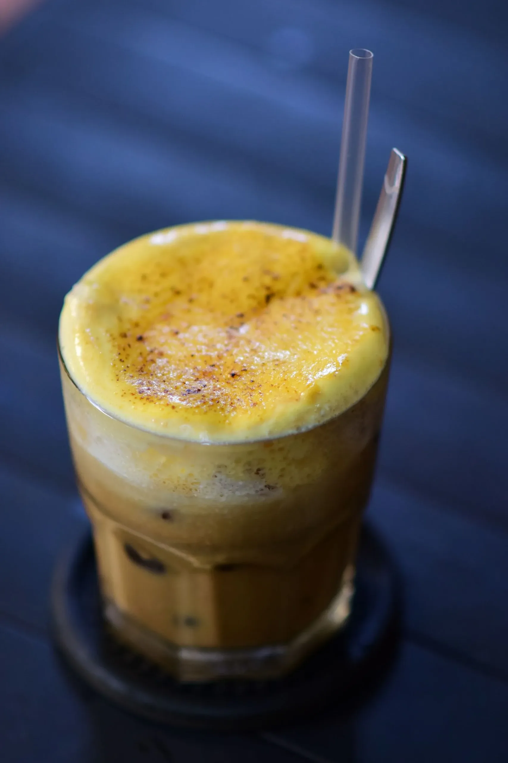 Traditional Vietnamese egg coffee served in a glass in Hanoi