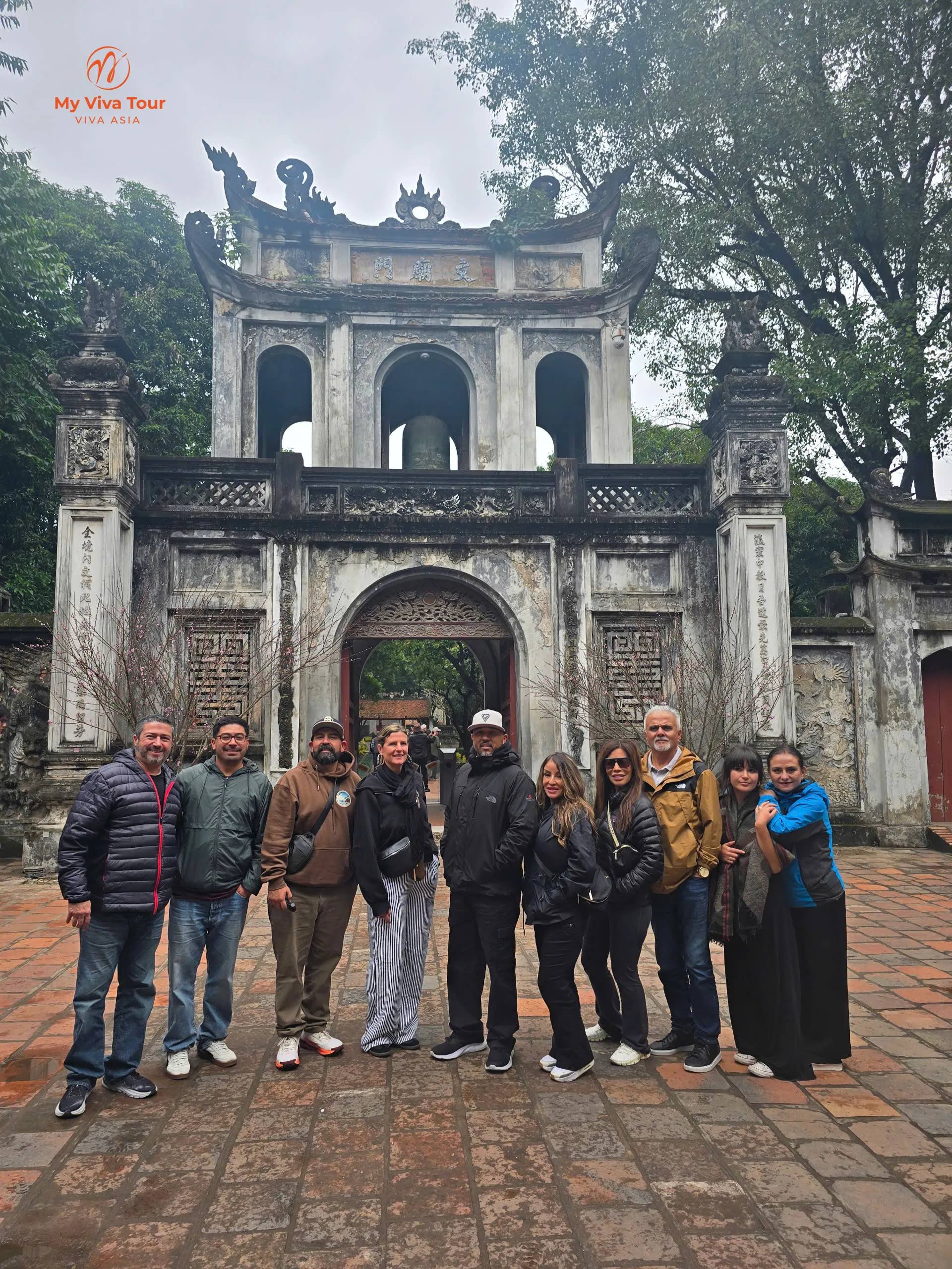 Patricia, Aida and the group at the Khue Van Cac gate of the Temple of Literature in Hanoi