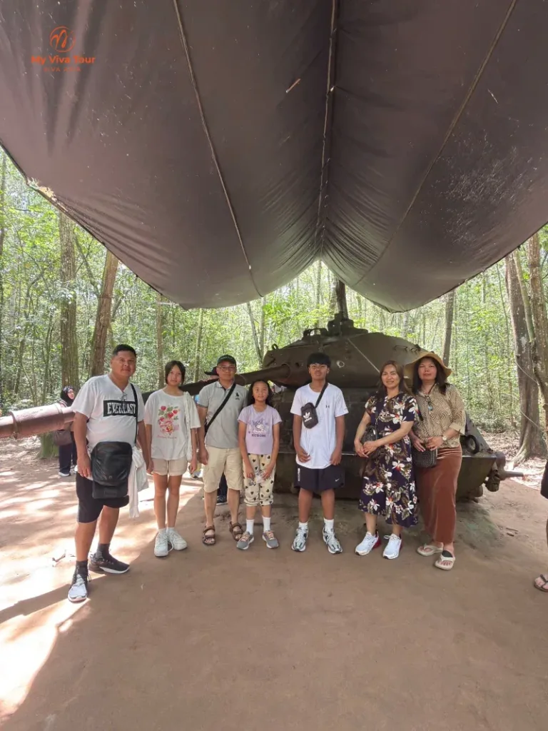 Jerome's family Vietnam trip group photo at the Cu Chi Tunnels near Ho Chi Minh City