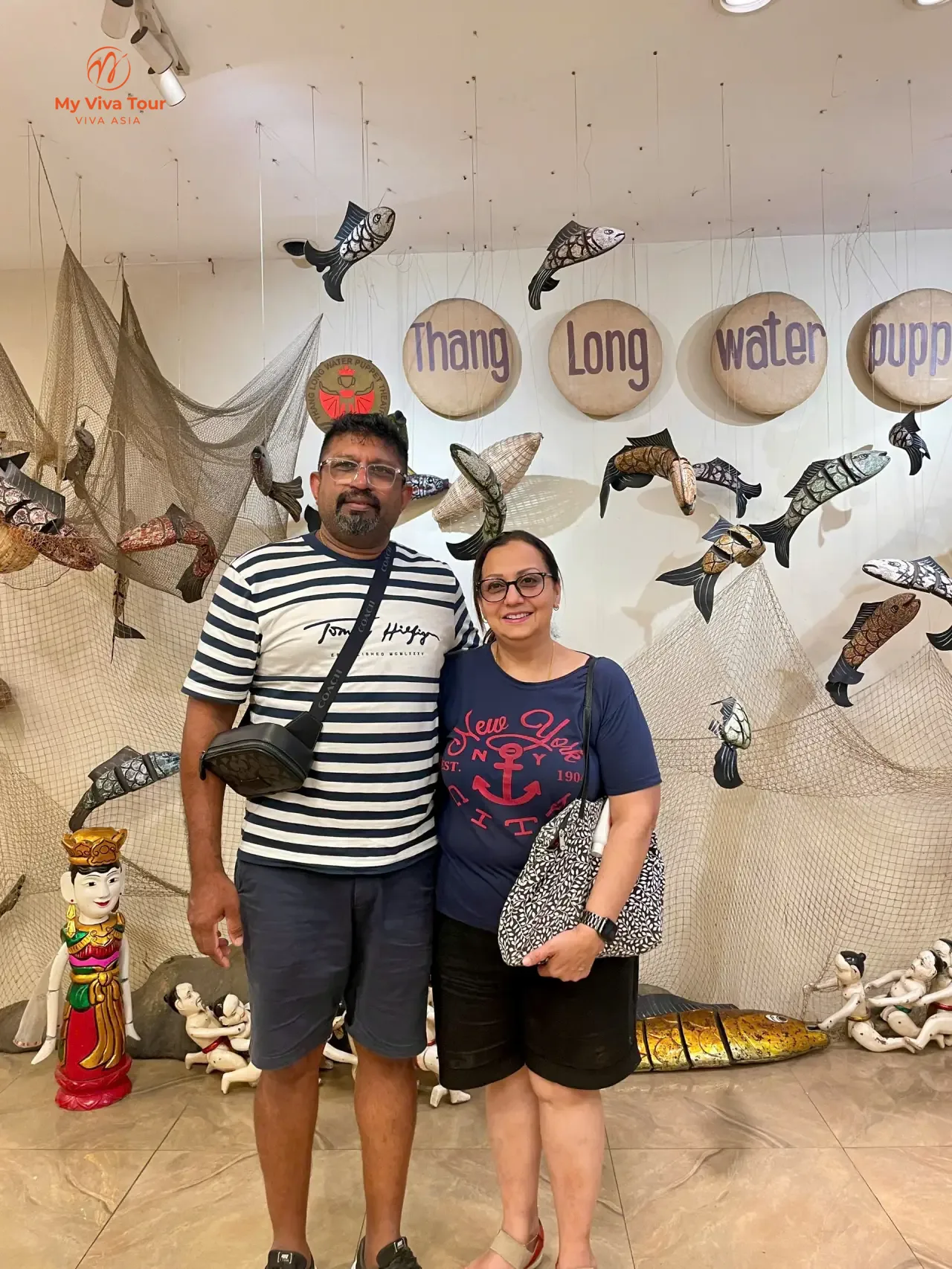Saneeta and her husband at the Thang Long Water Puppet Theatre in Hanoi's Old Quarter