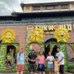 Santosh's family Vietnam trip — the family at the Ba Na Hills entrance gate, Da Nang
