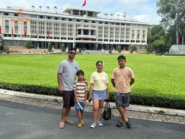 Santosh's family outside the Reunification Palace in Ho Chi Minh City