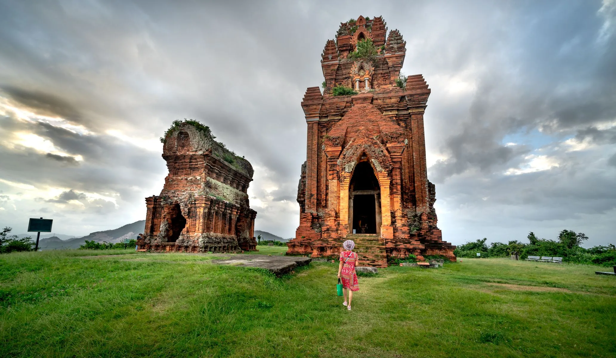 Solo traveller exploring ancient temple ruins on a solo trip to Vietnam