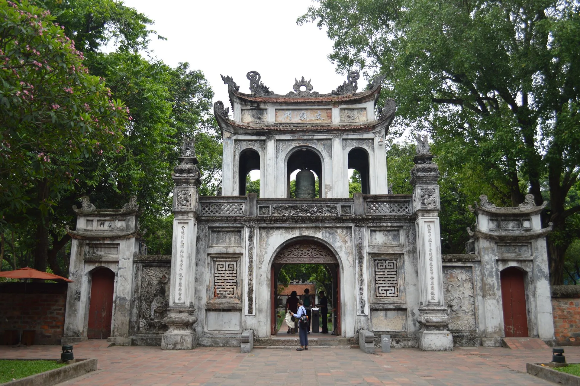 Ornate stone entrance gate of the Temple of Literature in Hanoi