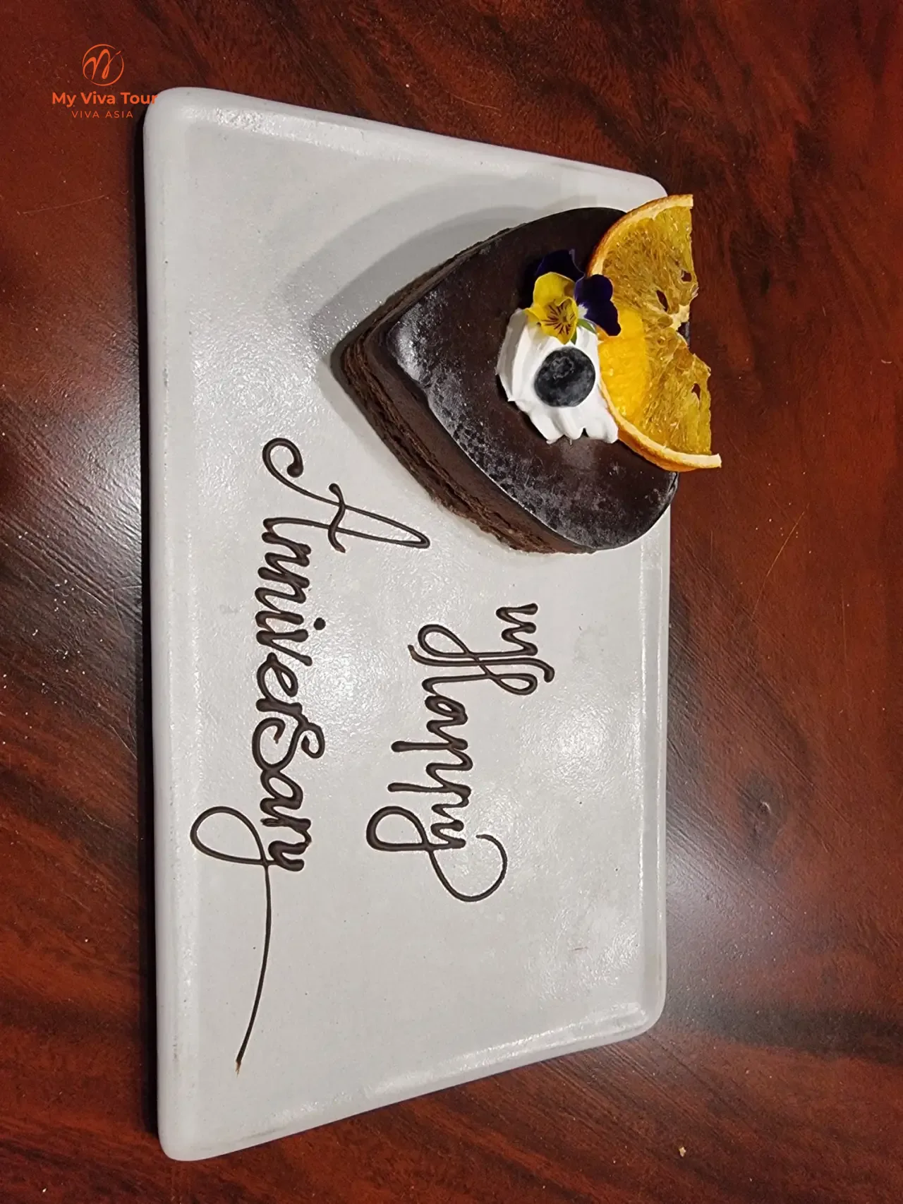 Happy Anniversary chocolate dessert plate celebrating Teresa and John's 30th anniversary in Vietnam