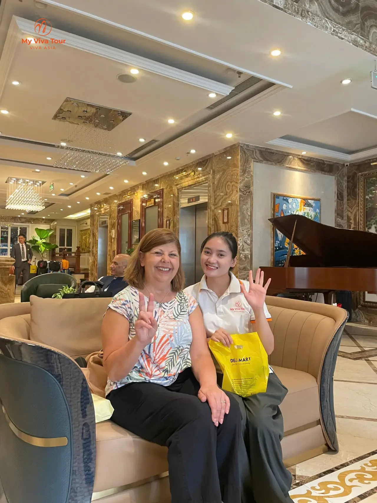Australian guest Teresa Bellis meeting My Viva Tour consultant Rachel in a Hanoi hotel lobby