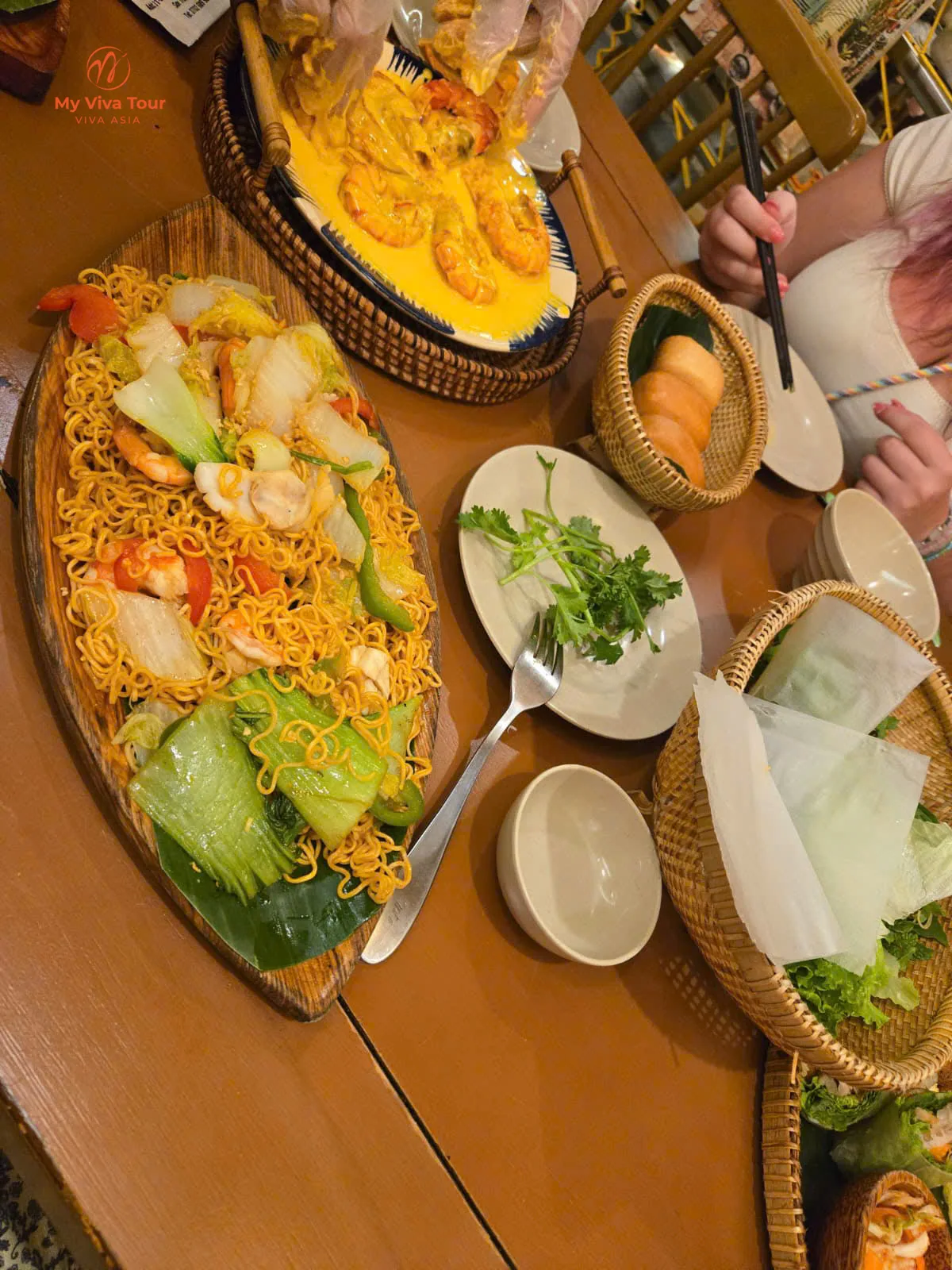 Vietnamese seafood noodles and shrimp curry served on a Hanoi food tour