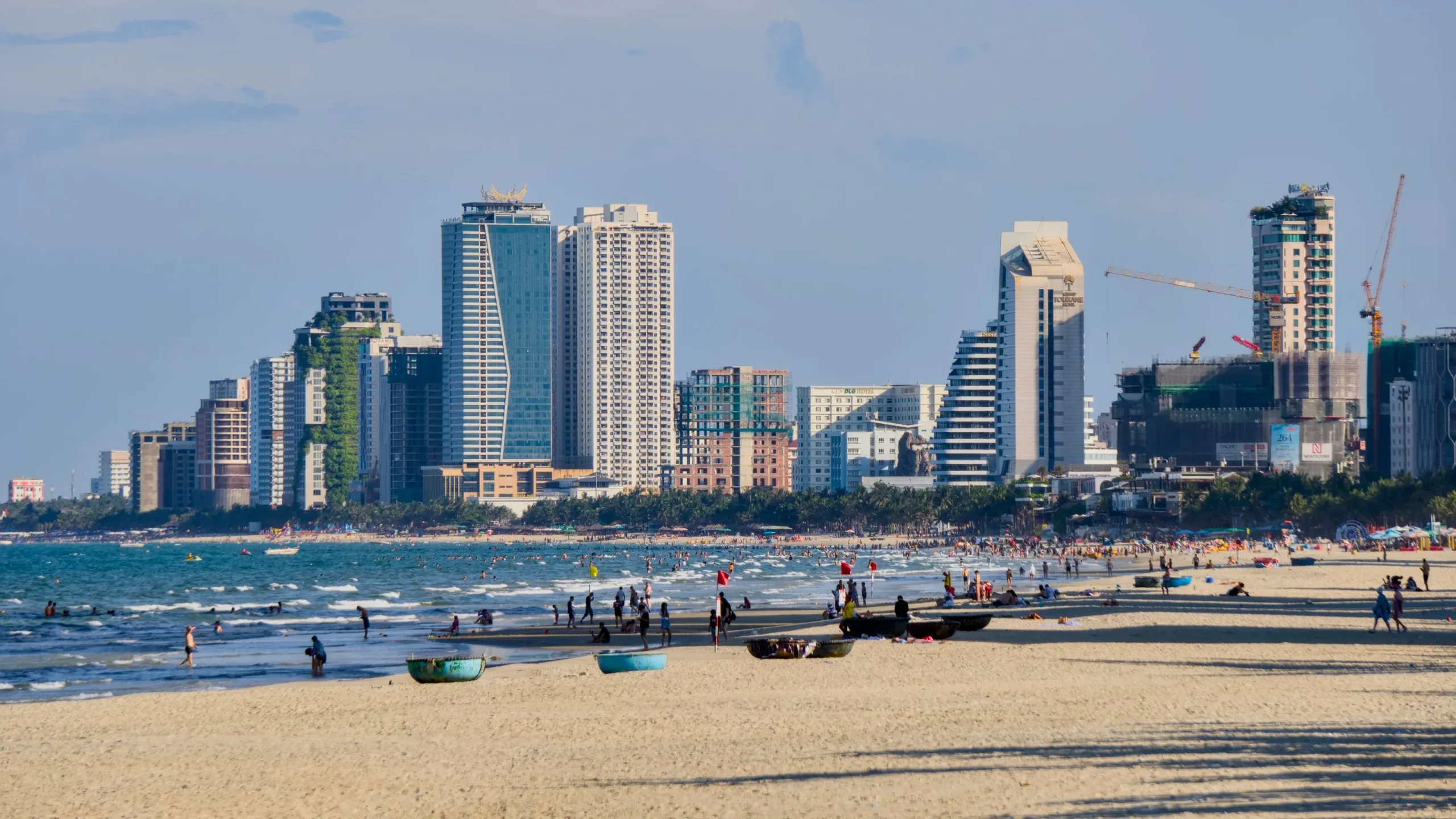 My Khe Beach with the Da Nang city skyline behind the shoreline