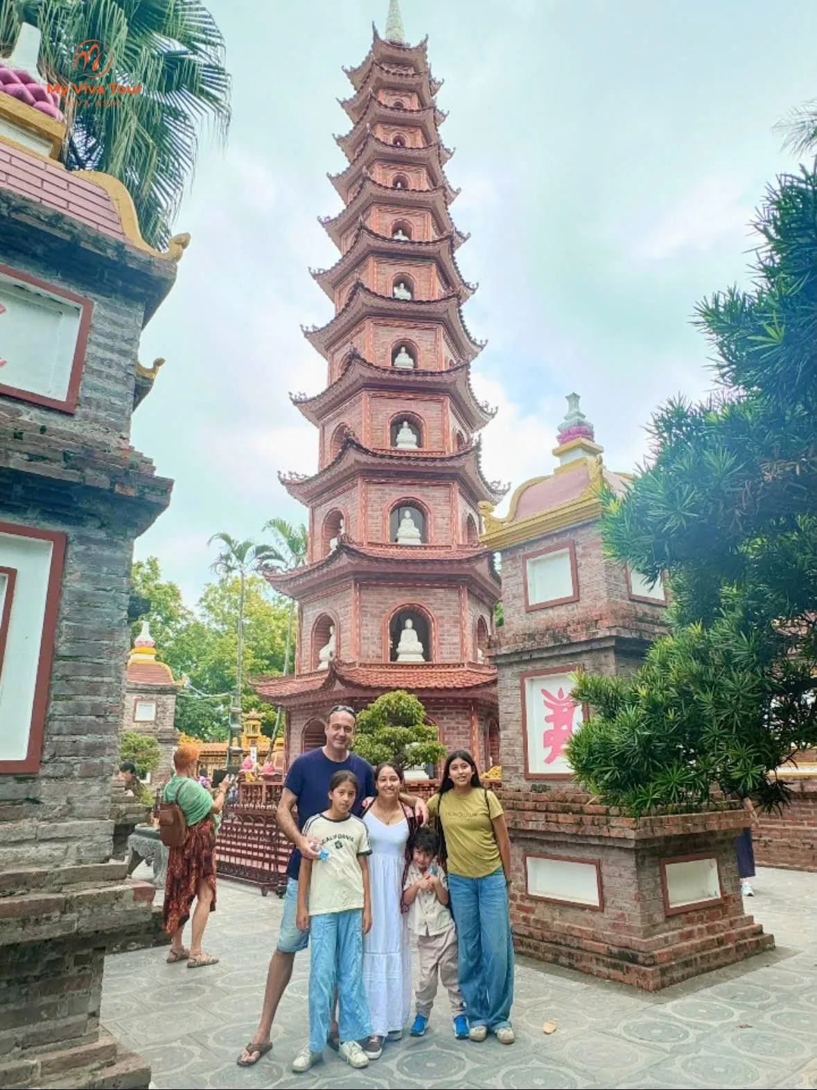 Family at Tran Quoc Pagoda on West Lake, Hanoi